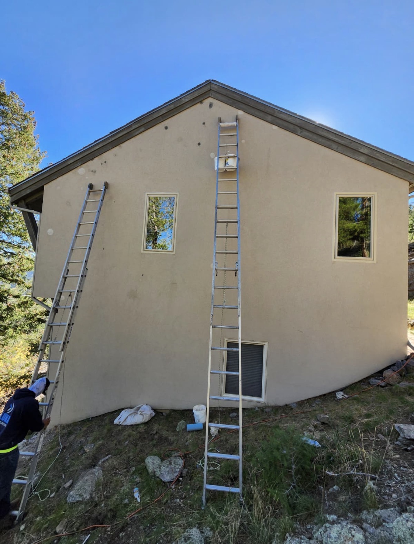 Luna Restorations crew repairing an EIFS exterior wall